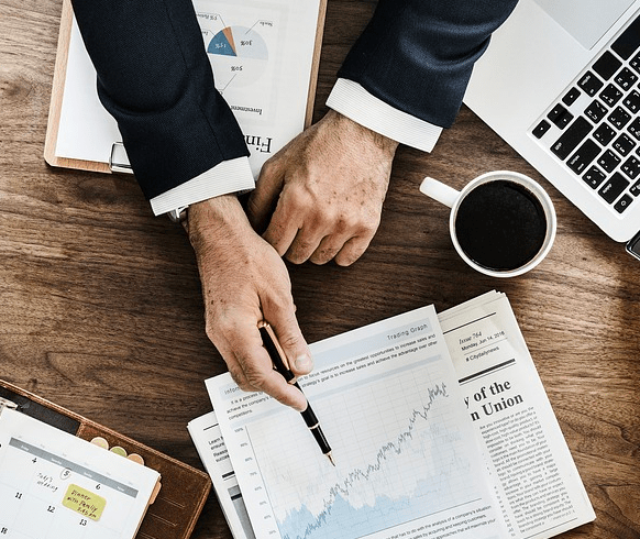 Signing investment papers.