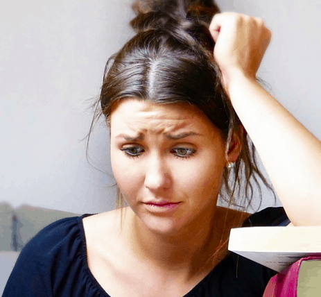 Stressed because she needs money today.