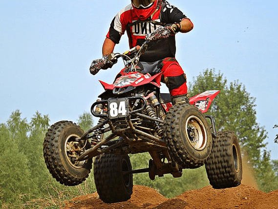 A man riding an ATV