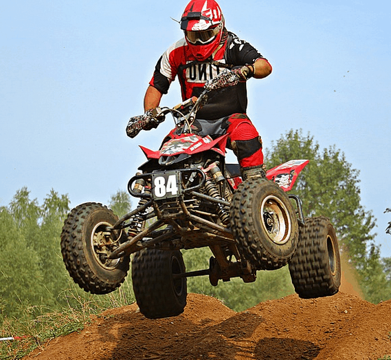 A man riding an ATV
