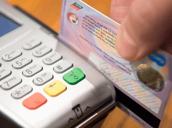 A credit card being run.