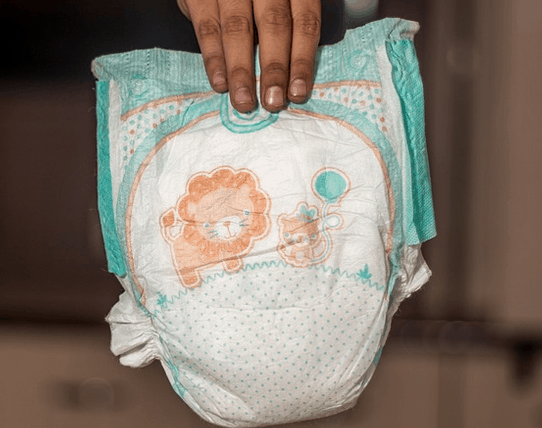 Holding a diaper