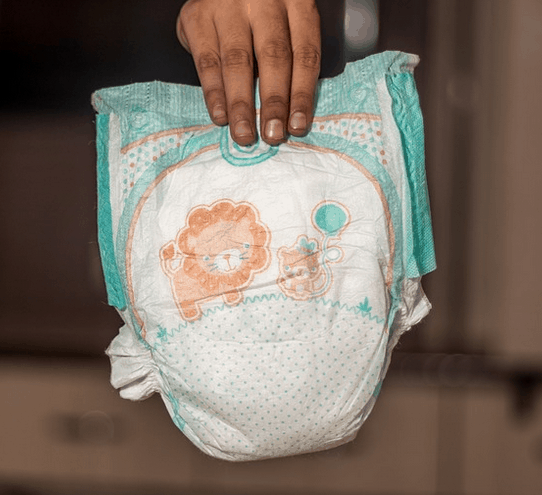 Holding a diaper