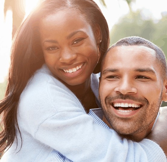 Happy people who just scored a loan.