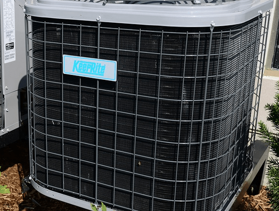 An HVAC system on the side of a home.