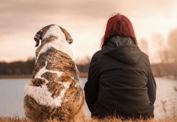 A woman who saves money on dog care.