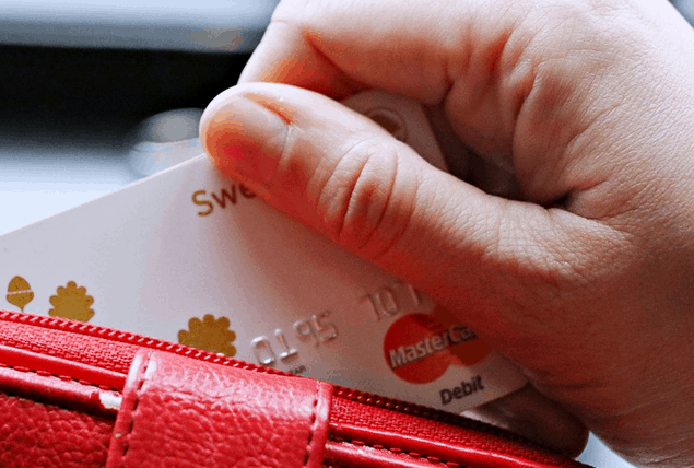 A woman using a credit card