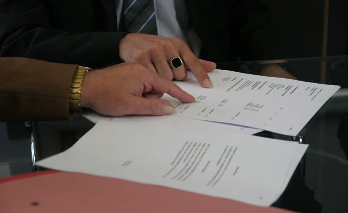 Negotiating the interest rate on a personal loan contract.