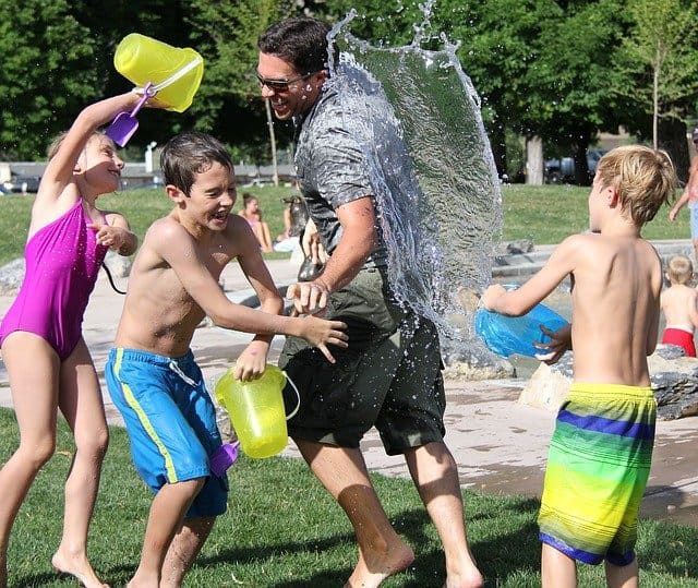 A water fight in the middle of summer.