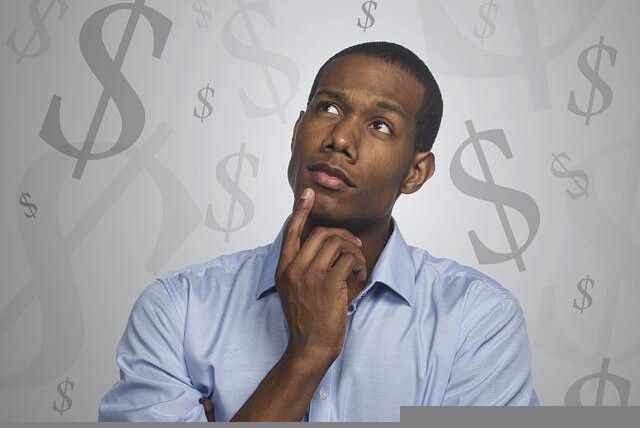 Man thinking of ways to stay on budget.